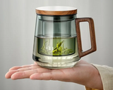 TeeMoment Aufgussbecher – 500-ml-Teeglas mit Sieb & Deckel | Hitzebeständiges Borosilikatglas mit Holzgriff | Für Losen Tee & Kaffee